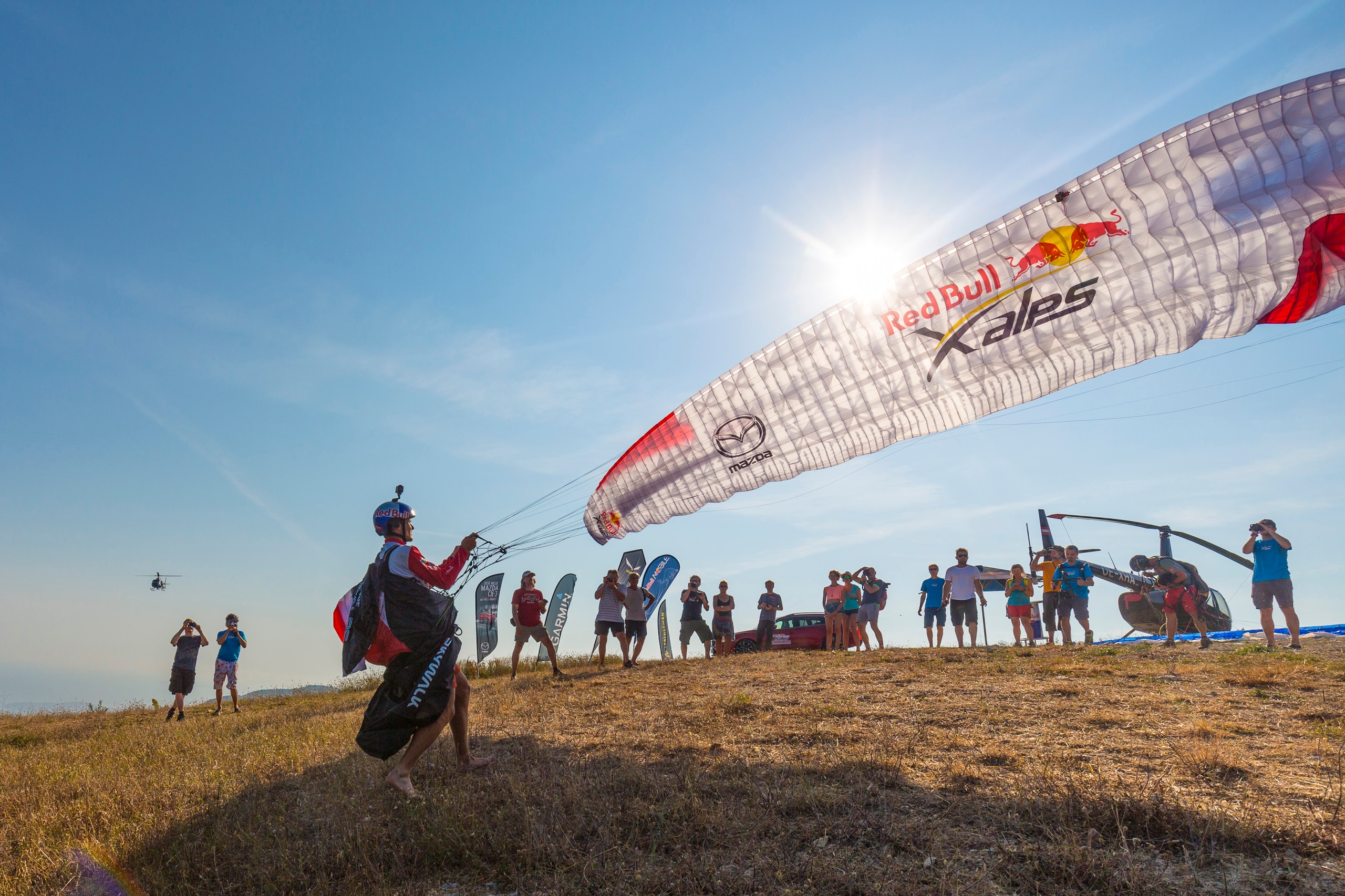 Paul Guschlbauer (AUT1) performs at the finish during the Red Bull X-Alps Peille, France on July 14th 2015